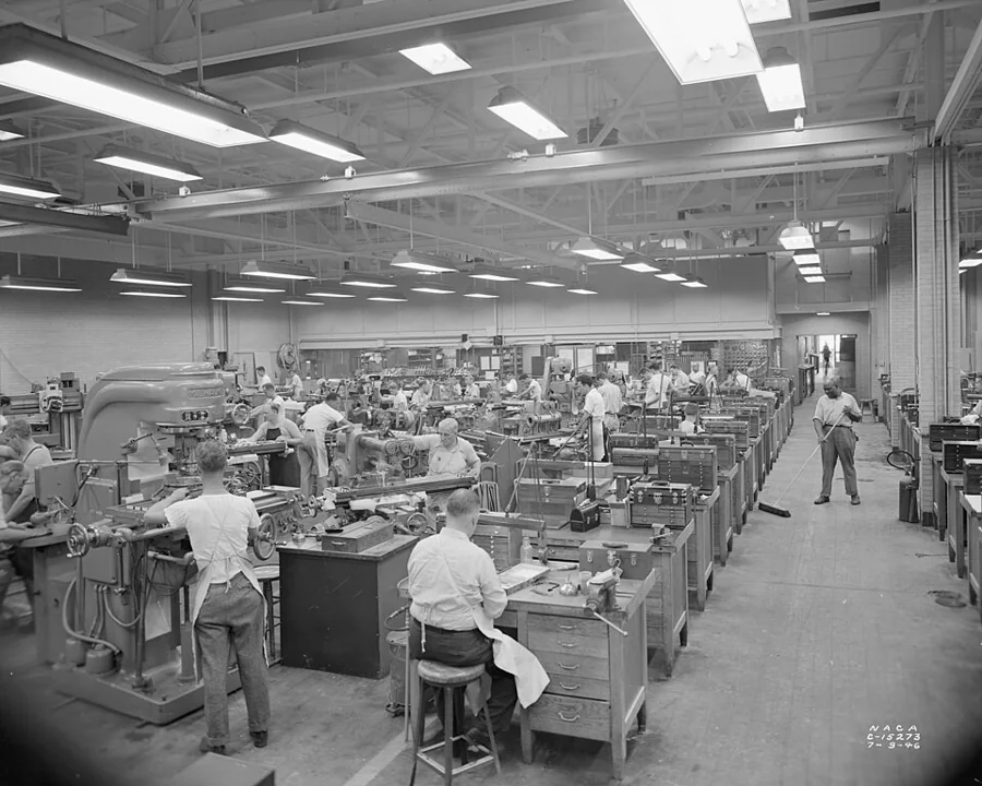 A machine shop floor with benches and equipment