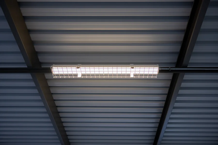 The interior roof structure of an industrial warehouse